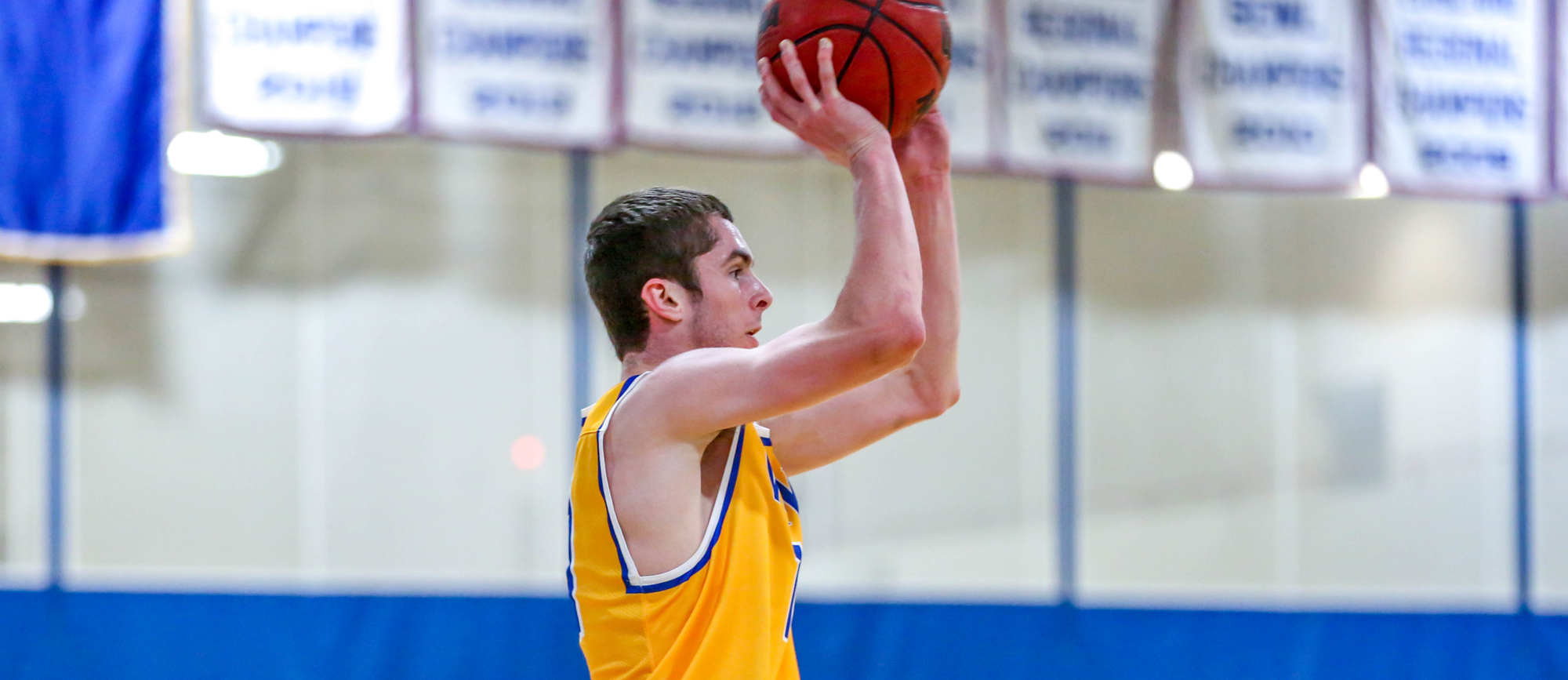 Sophomore guard Mike McGuire scored a team-high 16 points in Western New England's 78-60 win over MCLA at the Ken Wright Invitational on Friday night in Amherst (photo by Geoff Riccio).