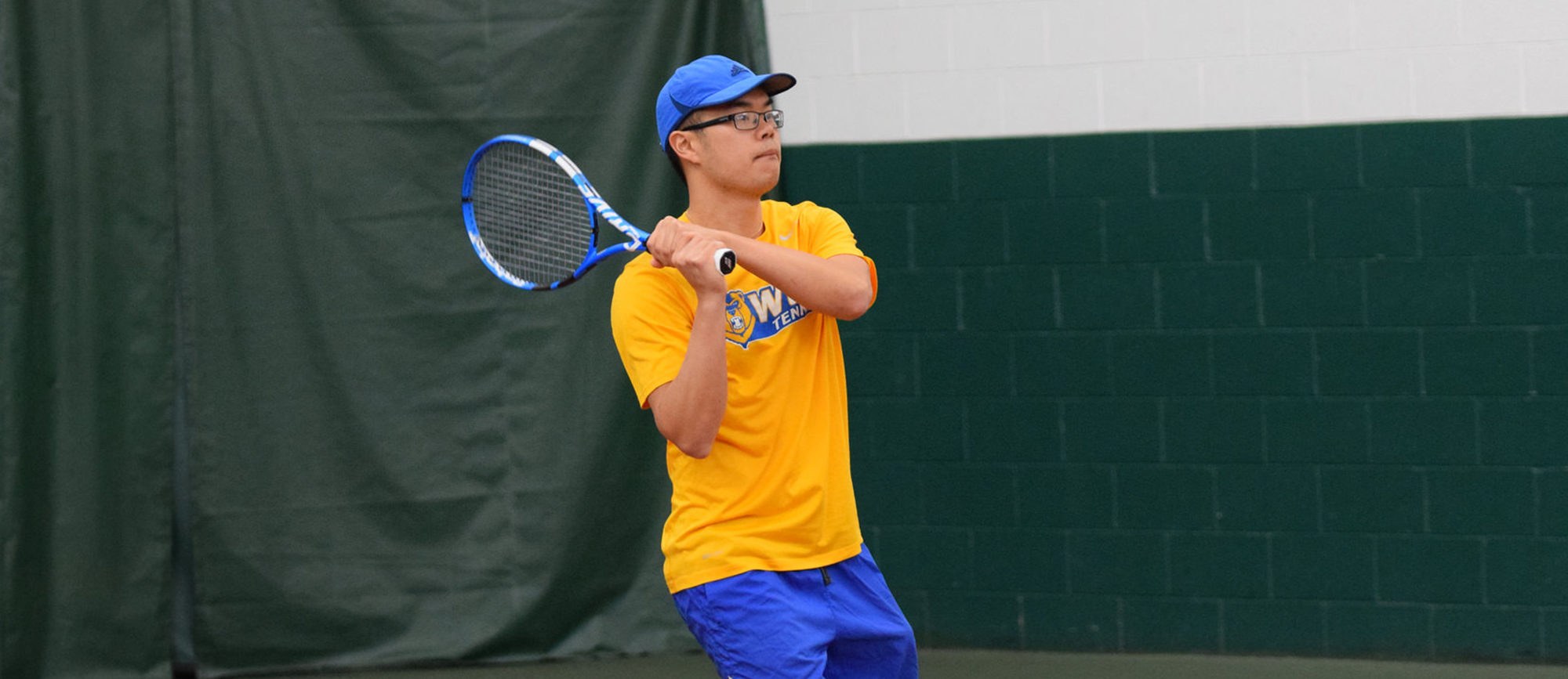Junior Michael Tran won at No. 5 singles in Western New England's 8-1 win over Brooklyn College in Orlando on Friday. (Photo by Rachael Margossian)